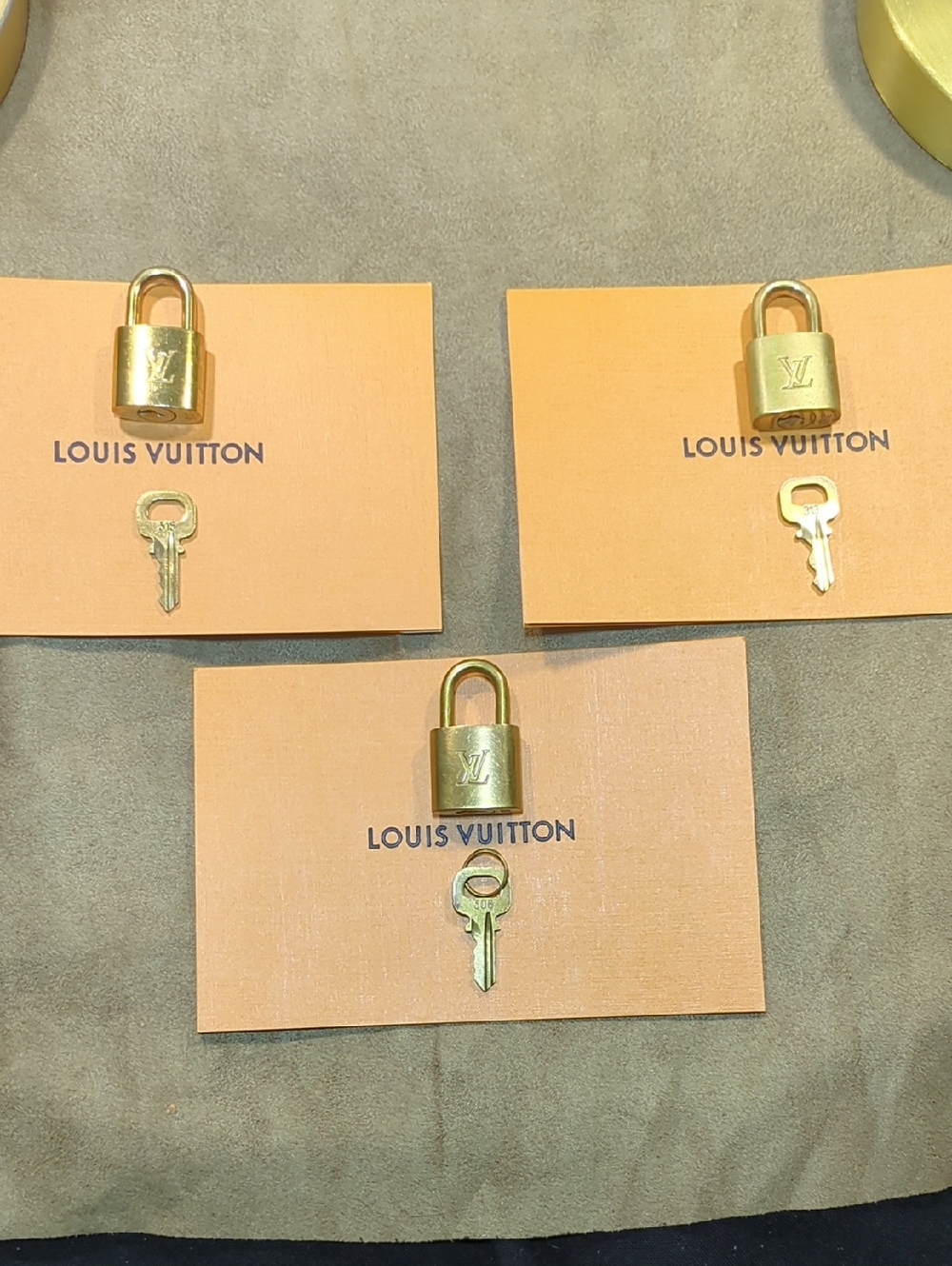 Louis Vuitton Gold-Tone Padlock and Key Set  Trio NOW ONLY $65 Each Your Choice